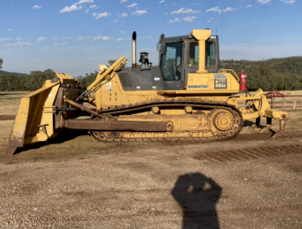2006 Komatsu D65ex-15eo and Gessner Stick Rake.