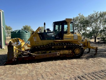 2006 Komatsu D65ex-15eo and Gessner Stick Rake.