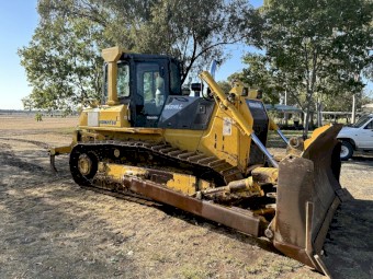 2006 Komatsu D65ex-15eo and Gessner Stick Rake.