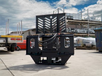 TREE PULLER SKID STEER ATTACHMENT.