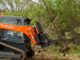 TREE PULLER SKID STEER ATTACHMENT.