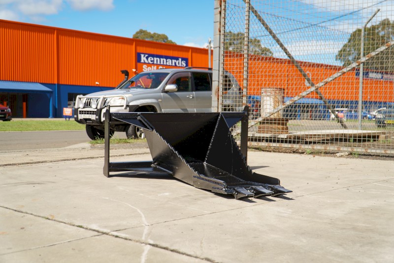 SKID STEER STUMP BUCKET TREE REMOVER.