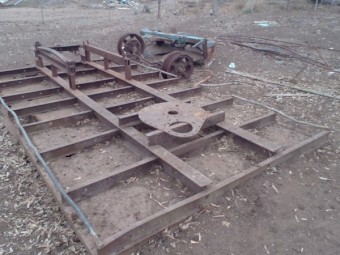 Truck tray and old gates and old mower
