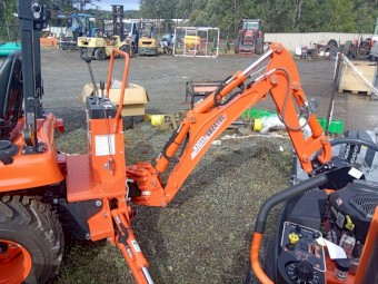 KIOTI CS2610 WITH LOADER AND BACKHOE ATTACHMENT