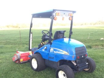 2012 New Holland G6030 and Trimax Flail Deck Mulcher