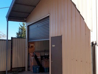Shed with roller door and lights 