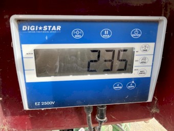 International 1086 Tractor with Strautmann 1450 Vertical mixer wagon