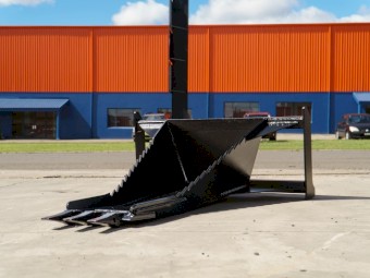 SKID STEER STUMP BUCKET TREE REMOVER.