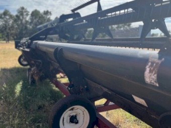 1042 McDon 36 ft Draper front with Comb Trailer