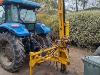 Fully hydraulic post knocker/driver