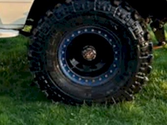 For sale or swaps 36 in mud tires and rims