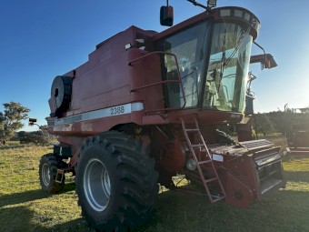 2002 Case IH 2388 Exclusive with 30ft 1010 front and Canola Pick Up Front