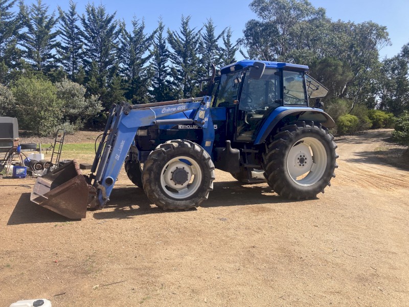New Holland TM115 with Challenge 1431 Loader