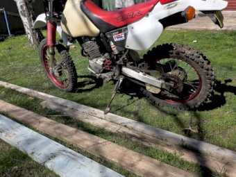 1998 Honda 250 R..11 months Rego. SWAP for family car?. Serviced and front back suspension seals replaced.