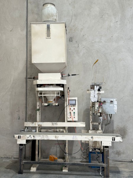 Semi automatic WPP bagging machine with load cells and weigh scale.