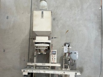 Semi automatic WPP bagging machine with load cells and weigh scale.