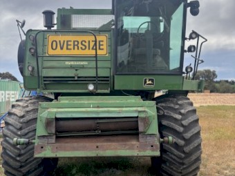 John Deere 7720 Combine Harvester with 24ft Header & Trailer