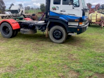 2002 Nissan UD Prime Mover & Drop Deck Trailer