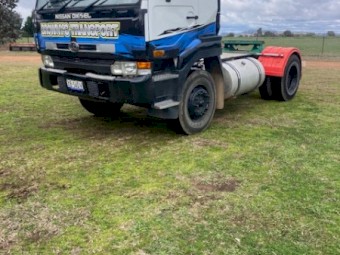 2002 Nissan UD Prime Mover & Drop Deck Trailer