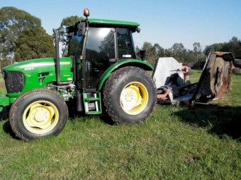 Tractor John Deere (45,000) + Rhino 3150-G Winged Slasher ($35,000)