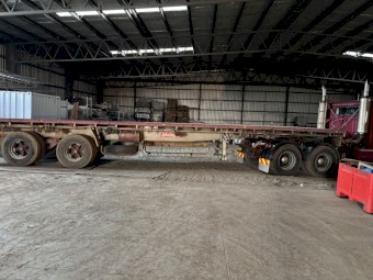 1993 International S-Line Prime Mover with 1986 Barker Tri Axle Semi Trailer