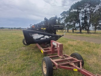 2015 MacDon D65 30ft Windrower Front