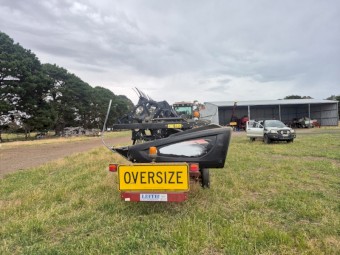 2015 MacDon D65 30ft Windrower Front