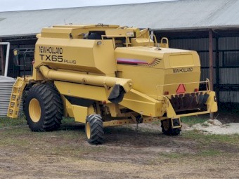 New Holland TX65 Plus Header with 30ft Honeybee Front and Trailer