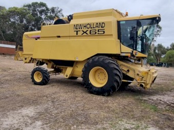 New Holland TX65 Plus Header with 30ft Honeybee Front and Trailer