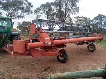 Case IH 21ft trailing windrower
