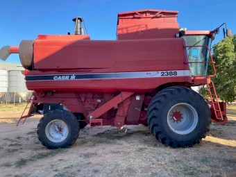 1999 Case IH 2388 with 1052 36ft Draper Front &amp; Trailer