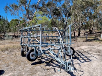 67 tine 8.3 meter spring-tine cultivator.