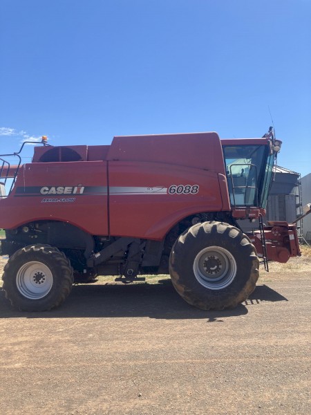 2011 Case 6088 Header with 35ft Draper Front & Trailer