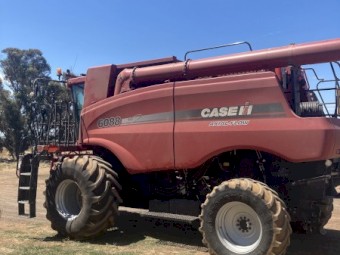 2011 Case 6088 Header with 35ft Draper Front & Trailer