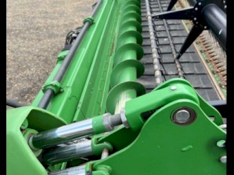 2012 John Deere 640D Front with x-auger and trailer