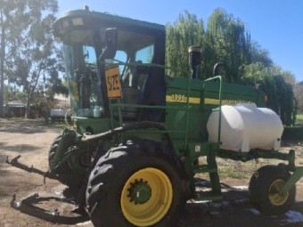 John Deere 4995 Windrower with 36ft Honey Bee Front