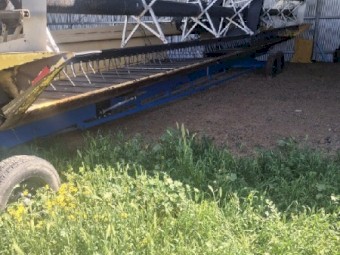 John Deere 4995 Windrower with 36ft Honey Bee Front