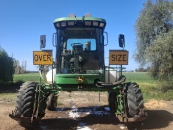 John Deere 4995 Windrower with 36ft Honey Bee Front
