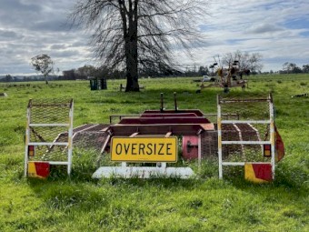 Windrower transport carrier 