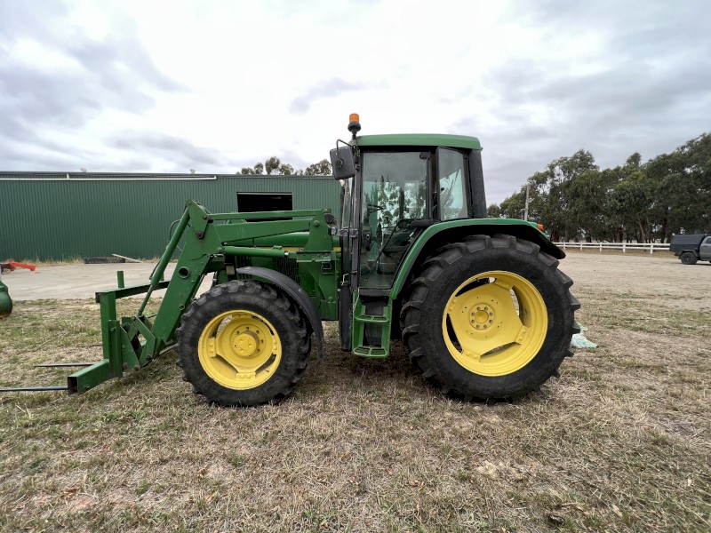 John Deere 6310 Tractor with 640 Loader and Forks