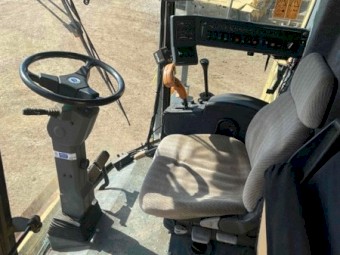 Conventional New Holland TX66 running and operational with 971 30ft front