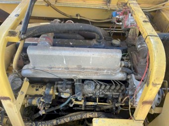 Conventional New Holland TX66 running and operational with 971 30ft front