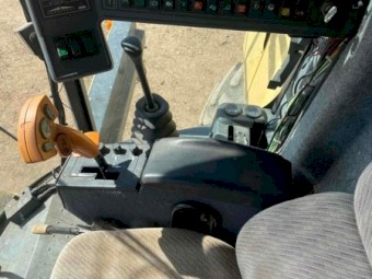 Conventional New Holland TX66 running and operational with 971 30ft front