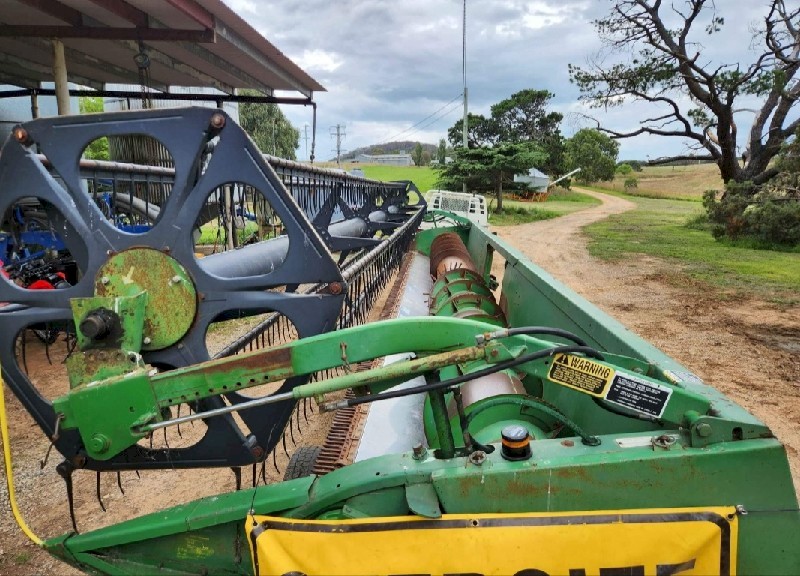 John Deere 9500 Header with 30ft Front and trailer