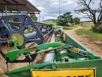 John Deere 9500 Header with 30ft Front and trailer