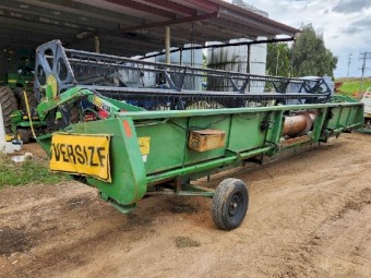 John Deere 9500 Header with 30ft Front and trailer