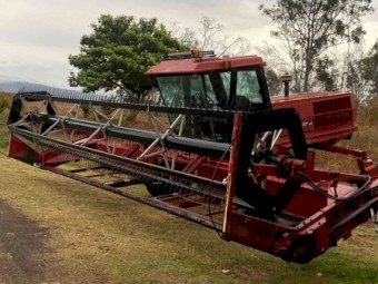 Case Ih 8825HP with 25ft draper front and leith trailer