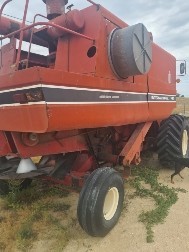 International 1420 axial flow header w John Deere front