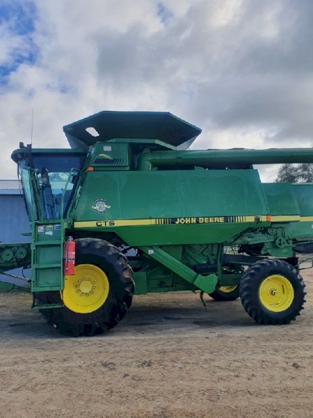 John Deere CTS Header with 930F front and trailer.