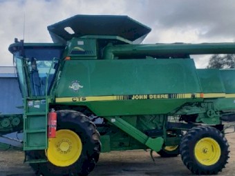 John Deere CTS Header with 930F front and trailer.